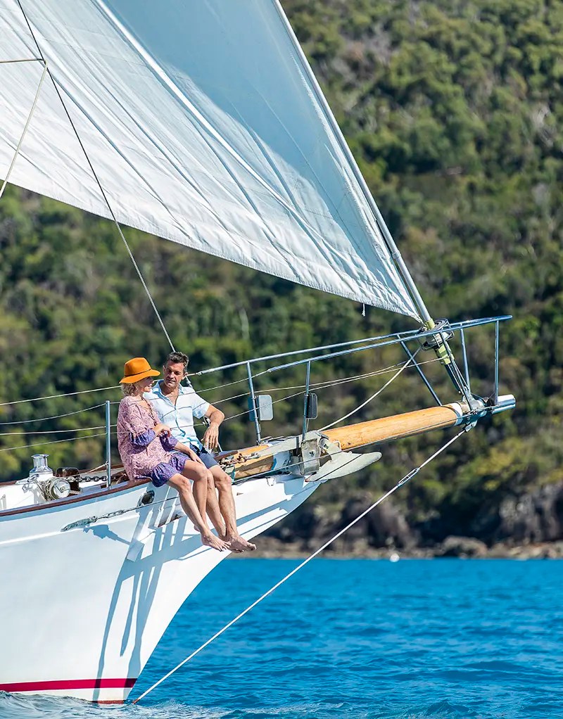 a person riding on the back of a boat