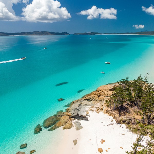 a pool next to a body of water