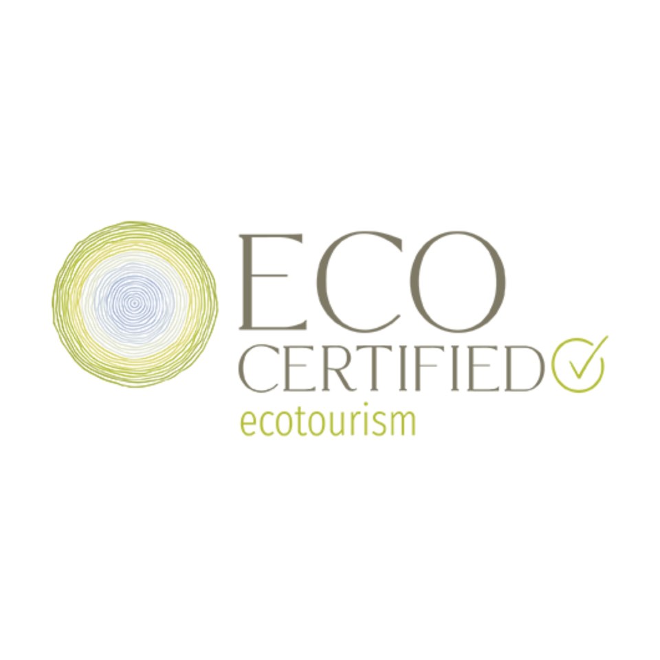 Eco Certified ecotourism logo with green circle and checkmark.